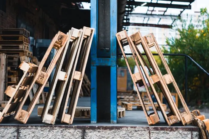 Used wooden pallets with their boards and blocks visible
